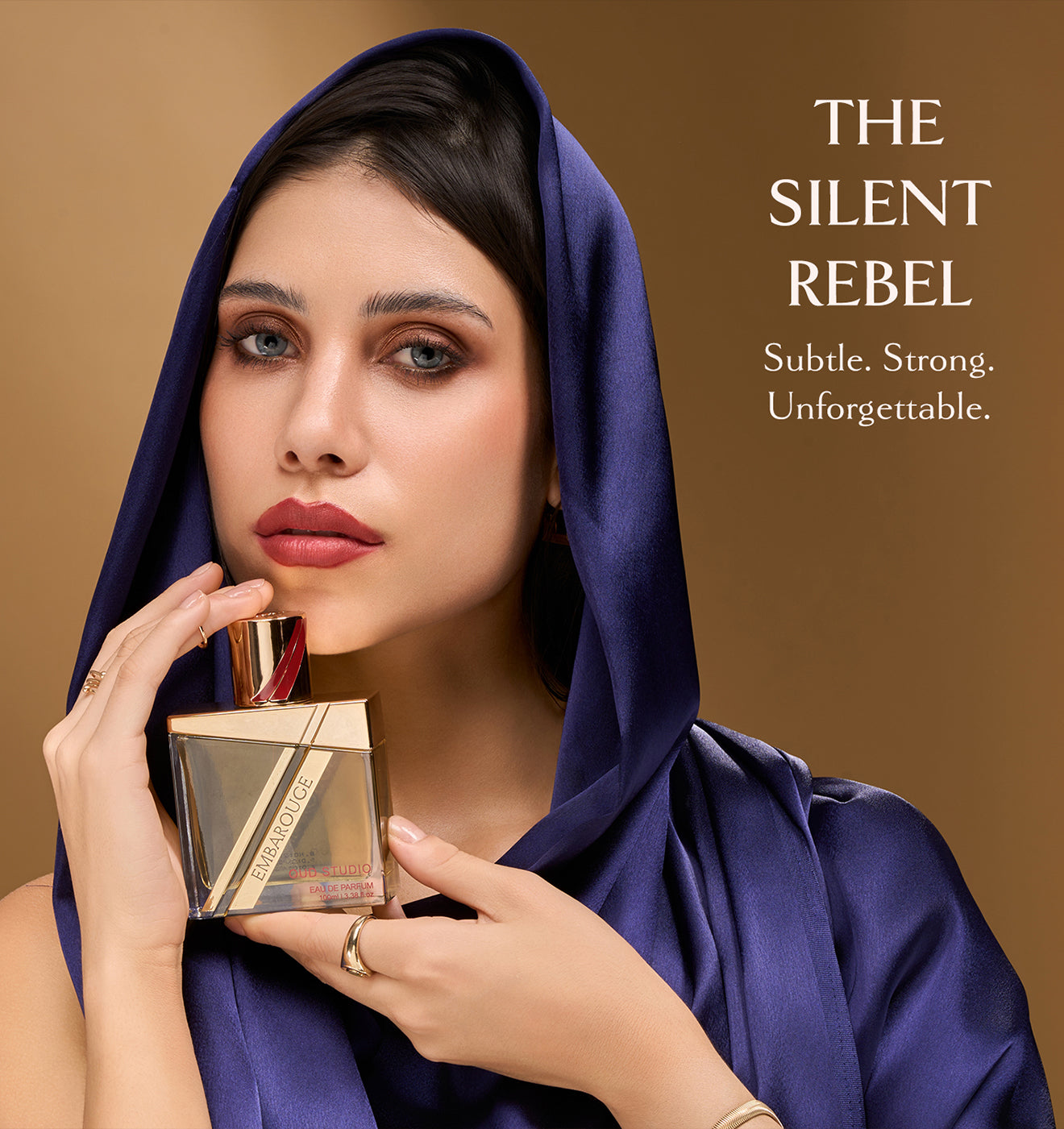 Women holding Embarouge Oud Studio Luxury perfume 100ml lifestyle image